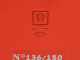 a close up of a red box with a sign on it