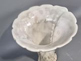 a white bowl that is sitting on a table