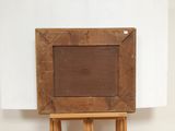 a picture of an easel with a painting on it
