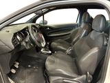 the interior of a car with the door open and the driver ' s seat up