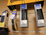 a display of different types of bicycle tires on the wall