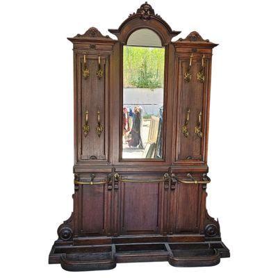 an image of a wooden armoire with a mirror
