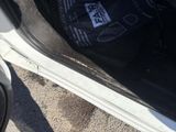 a black bag in the door of a car