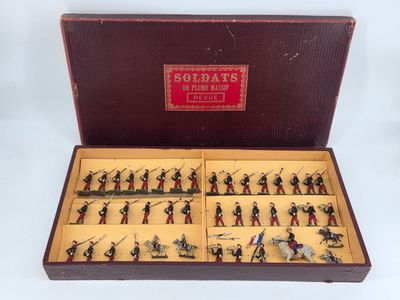 a box with a lot of toy soldiers in it