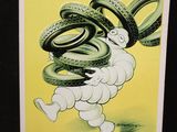une ancienne enseigne « Michel Tire » est affichée sur un fond noir