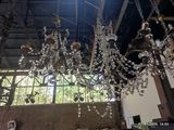 a large chandelier hanging from the ceiling in a building
