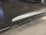 a close up of a car door handle on the side of the car