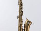 a close up of a saxophone on a white background