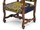 an image of a chair with a blue and yellow upholstered seat