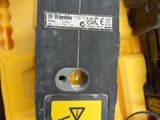 a close up of a yellow and black tool box