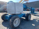 a picture of a blue and white lift truck parked in a parking lot
