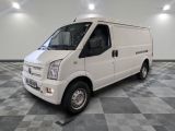 a picture of a white van parked in a room