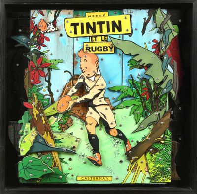 une photo d'un flipper « Tintin Rugby » dans un cadre vitré