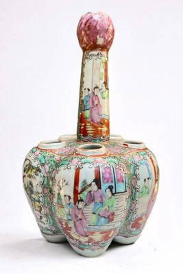 a vase that has a picture of a woman on it