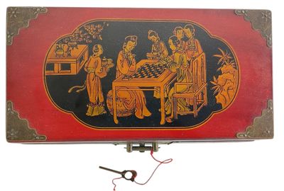 a red and black box with a picture of people playing chess