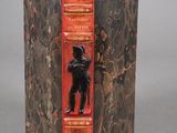 an old book with a picture of a man on it