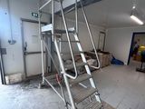 a metal ladder that is sitting in a room