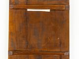 an old wooden box with a handle on a white background