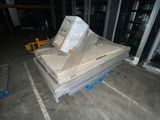 a pile of cardboard sitting on top of a pallet in a warehouse