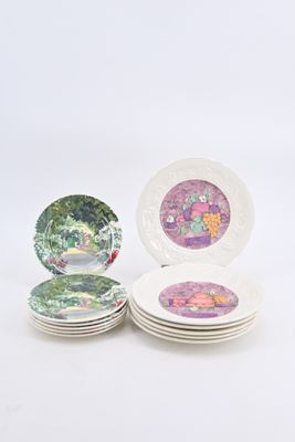 several plates are stacked on top of each other on a white surface