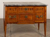a marble top dresser with drawers and a marble top top