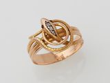 an image of a gold ring with a snake on top of it