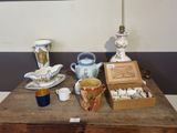 a wooden table with a lot of different items on it