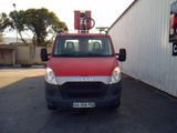 a picture of a red truck parked in a parking lot
