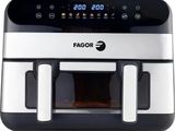 a close up of an air fryer with a digital clock on it