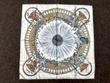 une photo d'un morceau de tissu orné d'un motif
