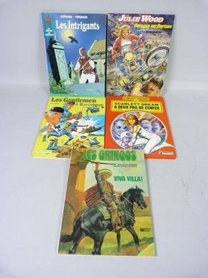 quatre livres pour enfants posés sur une surface blanche