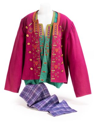pink jacket with green and purple trim and matching tie and pants