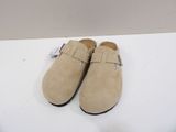 men ' s tan sued slippers with buckles on each side