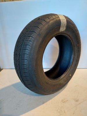 a close up of a tire on a white surface with a white background