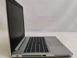 a laptop computer that is sitting on a table
