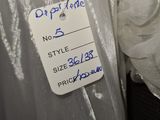 a picture of a white shirt with a price tag attached to it