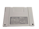 an old nintendo game on a white surface