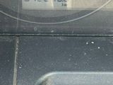 a close up of a car ' s dashboard with a speedometer