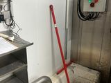 an image of a commercial kitchen with stainless steel appliances