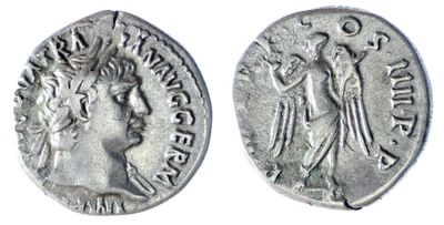 a silver coin with an image of a woman and a man on it