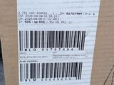 a box with a barcode on it sitting on the ground