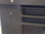 a close up of a piece of metal with a hole in it