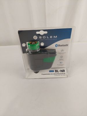 a close up of a box of bluetooths on a white surface