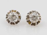 a pair of diamond earrings
