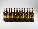 six bottles of beer lined up in a row on a white surface