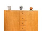 a wooden cabinet with a clock on top of it