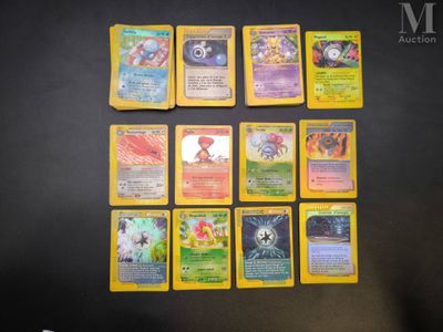 a lot of pokemon cards that are on the table