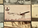several old photos of people standing around an airplane in a field