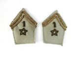 pair of two military patches with a star and a house