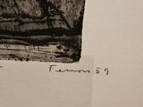 someone is drawing a black and white picture on a piece of paper